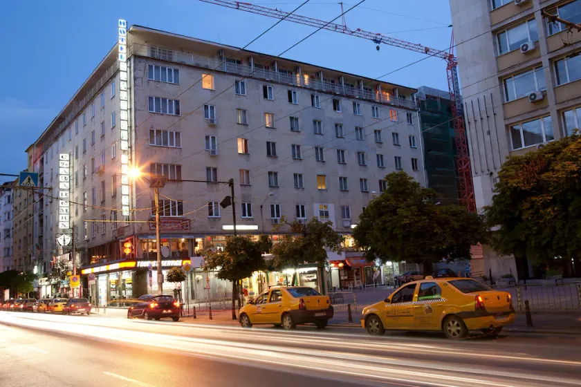 Renovated hotel rooms located in the center surrounded by points of interest. - Image 1