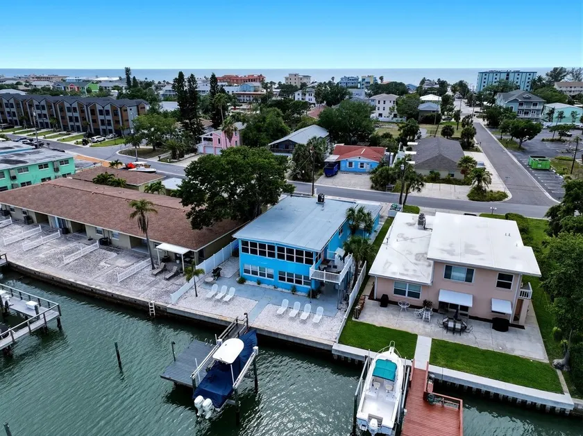 Bring your boat • 3 min walk to beach (wagon, towels, & umbrella provided) • Sunset/waterfront views from your backyard- Sleeps 6, Dog Friendly.  Watch dolphins and marine wildlife as you sip your coffee or cook up BBQ at night. Newly renovated! - Image 1
