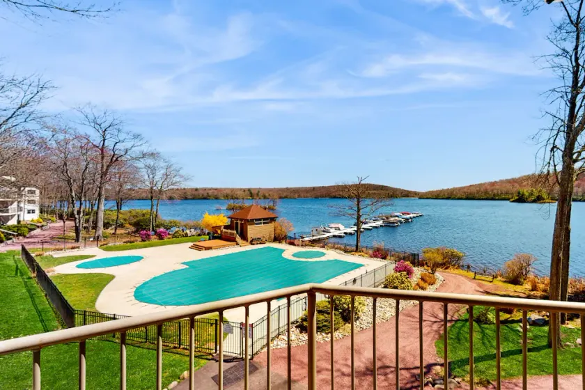 1st-floor lakefront condo with mountain views & pool - near ski/hiking - Image 1