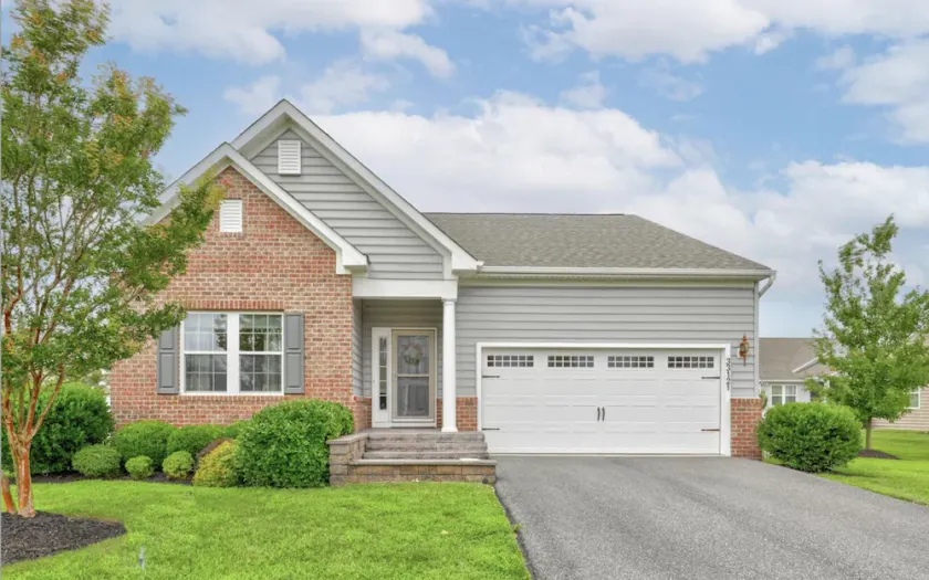 Convenient Lewes location with fenced yard, game room and huge community pool! - Image 1