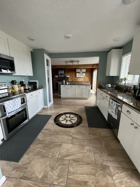 Watch the Boats Go By at Mariner’s Rest.  A Wonderful Waterfront Family Home - Image 1