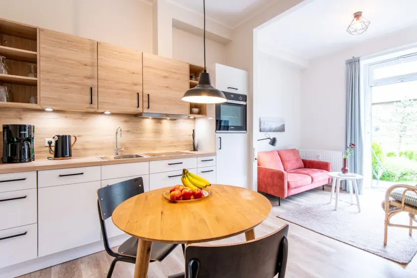 Ferienwohnung im Erdgeschoss mit Eigener Holzterrasse - Image 1