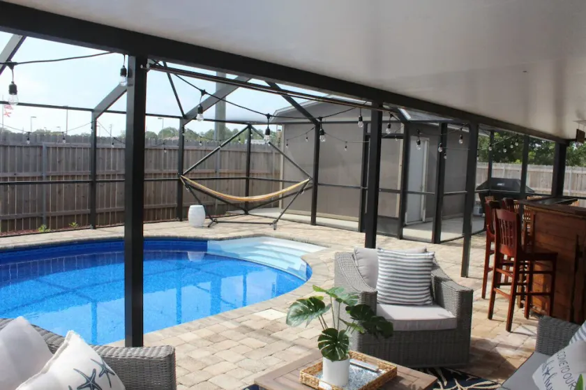 Poolside Retreat! Private pool & hot tub! Only 5 min to Beach! - Image 1