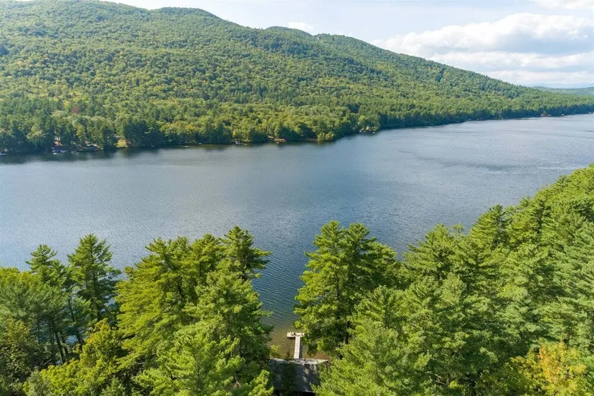 Moose Pond Retreat: Serene Lakeside Sanctuary with Private Dock - Image 1