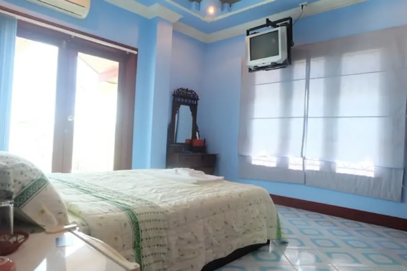 Chambre 5, parfaite pour les couples pour une escapade confortable. - Image 1