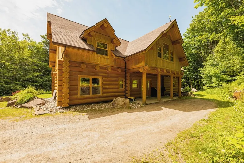 ChaletsOais Luxuriöses Blockhaus am See mit 5 Schlafzimmern, eigenem Whirlpool und Sauna - Image 1