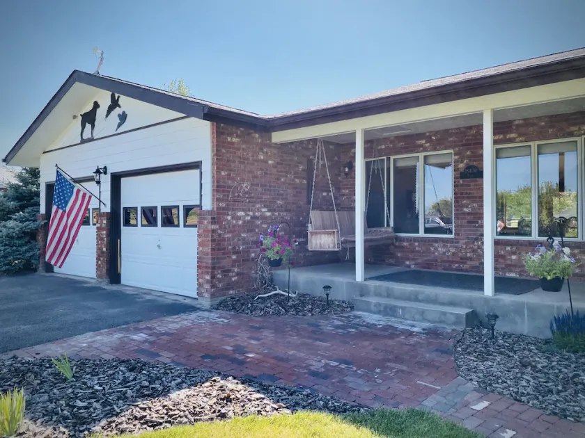 Ranch-style home with horse property and fenced yard - Image 1