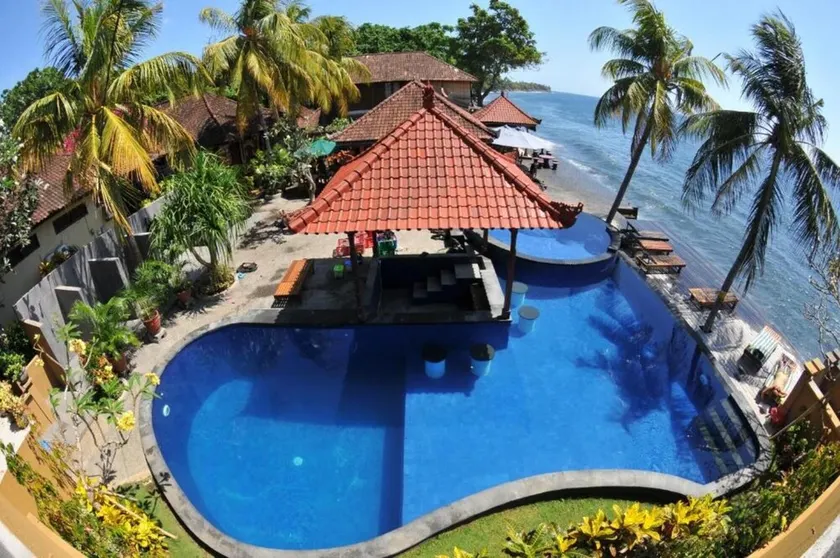 Paradise Palm Beach Bungalows and Dive Center - Image 1