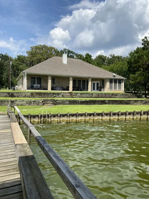 Lake front property on 3 acres offering privacy and never ending views. - Image 1