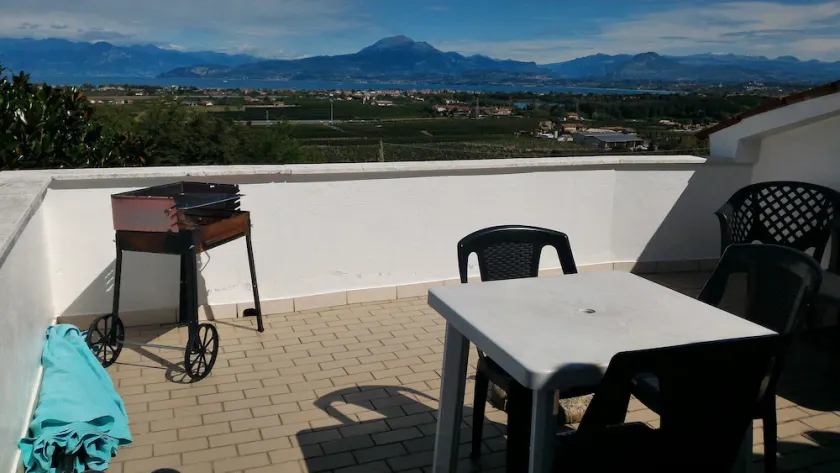 Lake Garda: penthouse garden with lake view in Peschiera GRADITI ANIMALS - Image 1