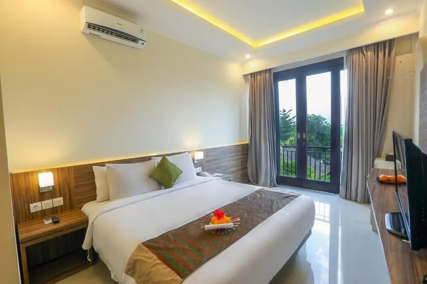 Gemütliches Zimmer in einem kleinen Resort in Jimbaran, in der Nähe von Rockbar und Tegalwangi Beach - Image 1