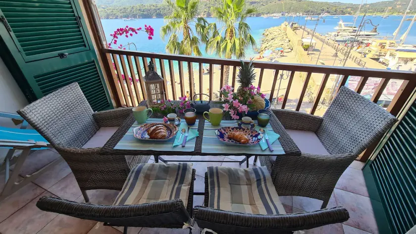 Blue harbor lovely apartment with terrace above the beach. - Image 1