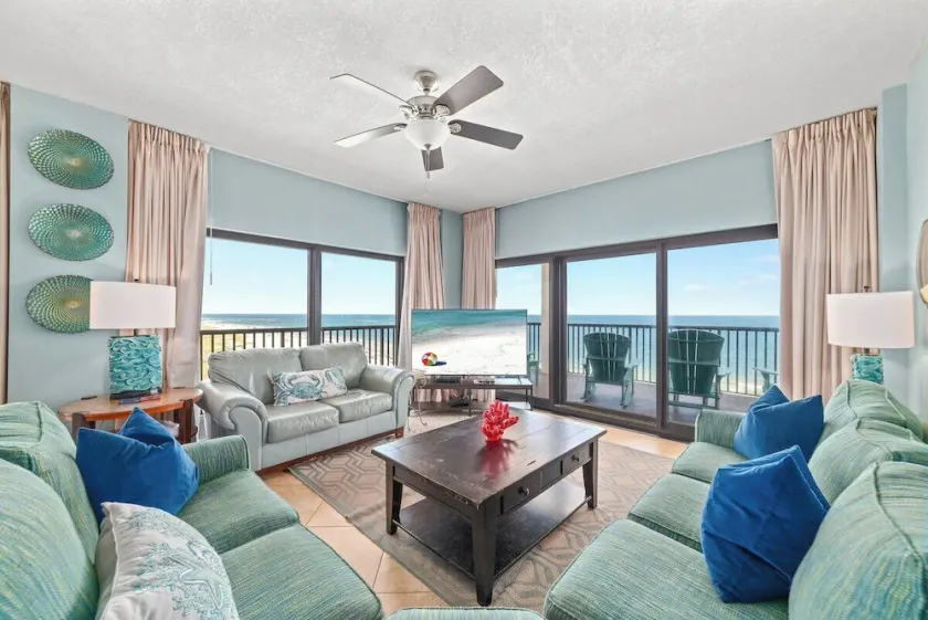 Gulf-front condo with spacious balcony resort amenities and cheerful interior - Image 1