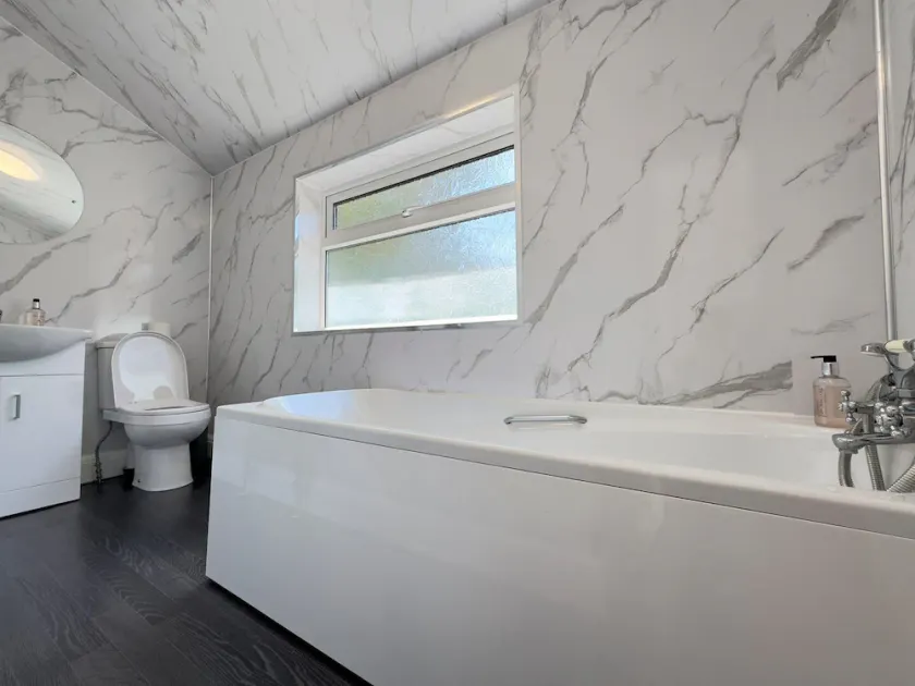 NEAR AIRPORT Fully Detached Home with 2 Off-Street Parking Spaces - Image 1