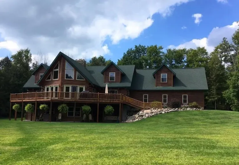 Stunning Log Cabin on 65 Acres with a new swimming pool - Image 1