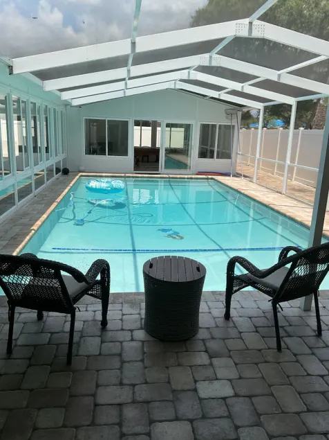 This place has swimming pool with water heater and parking for many cars. - Image 1