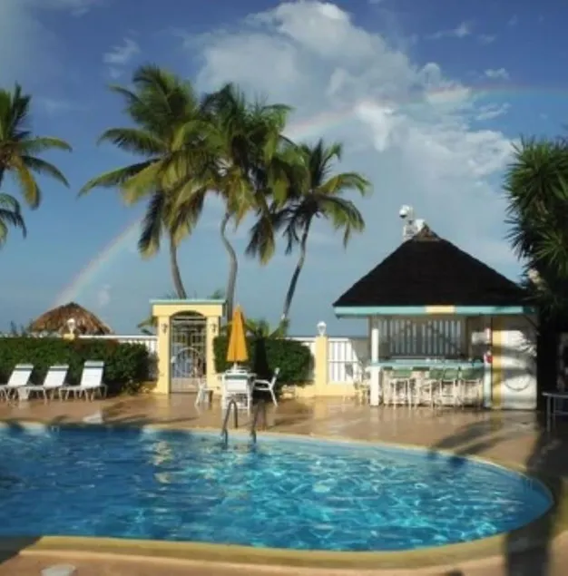 First Floor. Central A/C. Steps to the beach. Inquire about our monthly rate. - Image 1