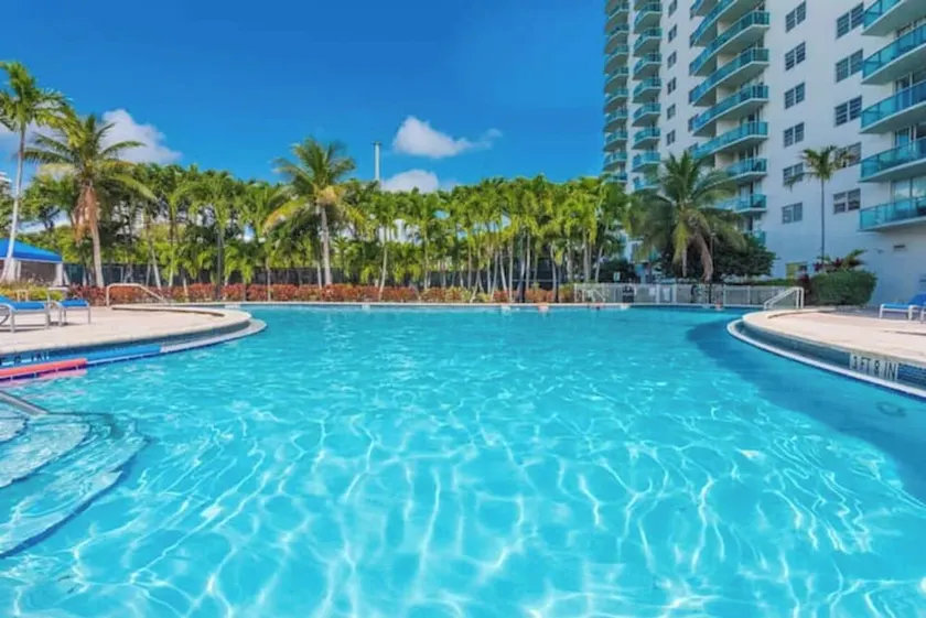 Entire condominium with a pool view, steps from the beach - Image 1