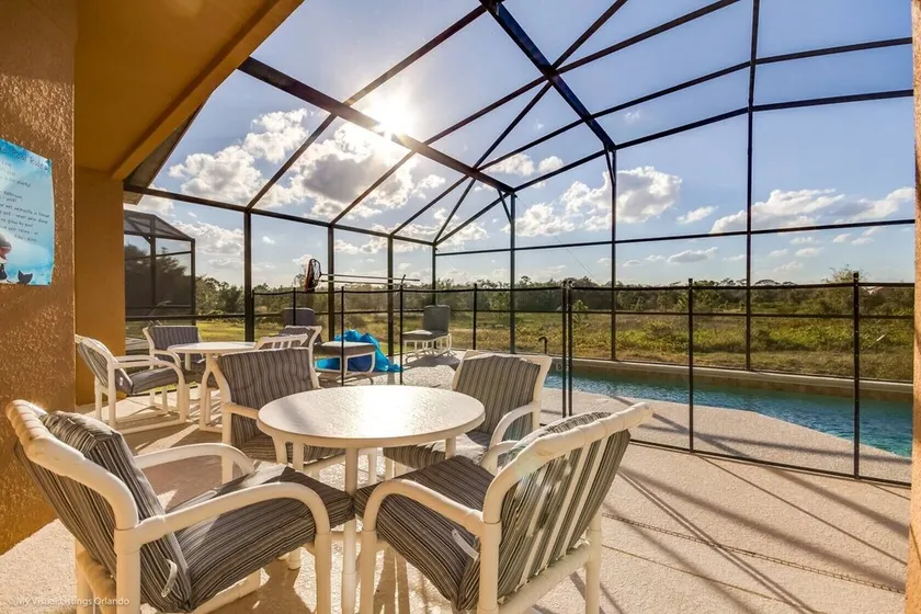 Family friendly villa with no rear neighbors at pool deck facing south and west. - Image 1