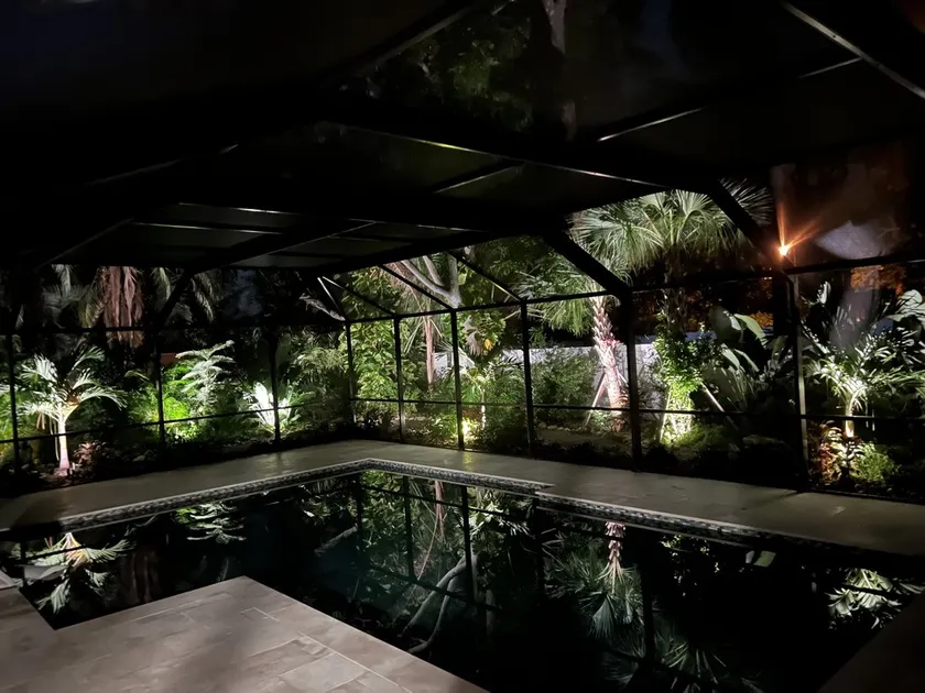 Stunning saltwater pool and spa with mature FL landscaping for complete privacy. - Image 1