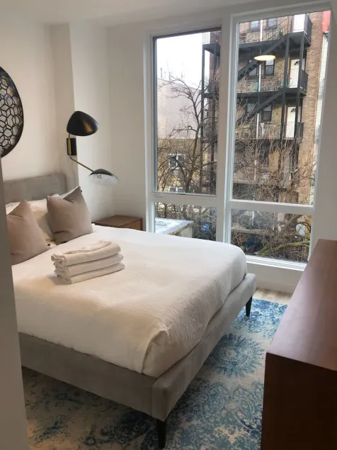 Sun-kissed 3BR Loft With Patio Minutes to NYC - Image 1