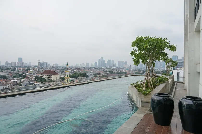 New Furnished 1BR @ Nine Residence Apt By Travelio - Image 1