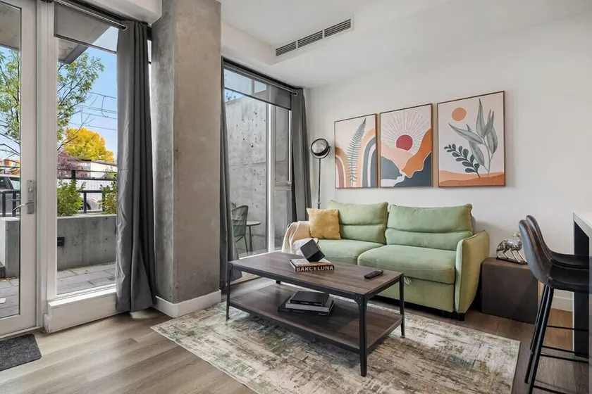 Upscale Industrial Condo with Patio near LRT - Image 1