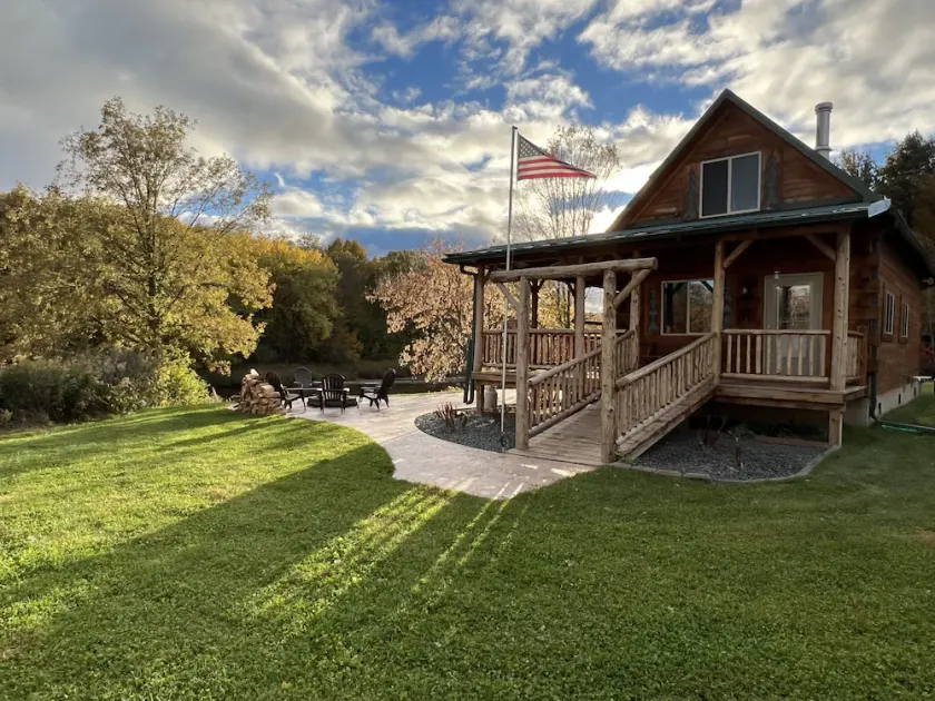 Relax at The Lincoln Log Cabin perched along the Jump River. - Image 1