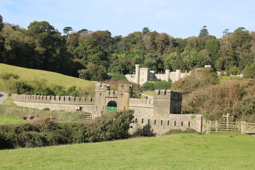 Turreted gatehouse to the historic Caerhays Castle located on the beach on the south Cornish Coast - Image 1