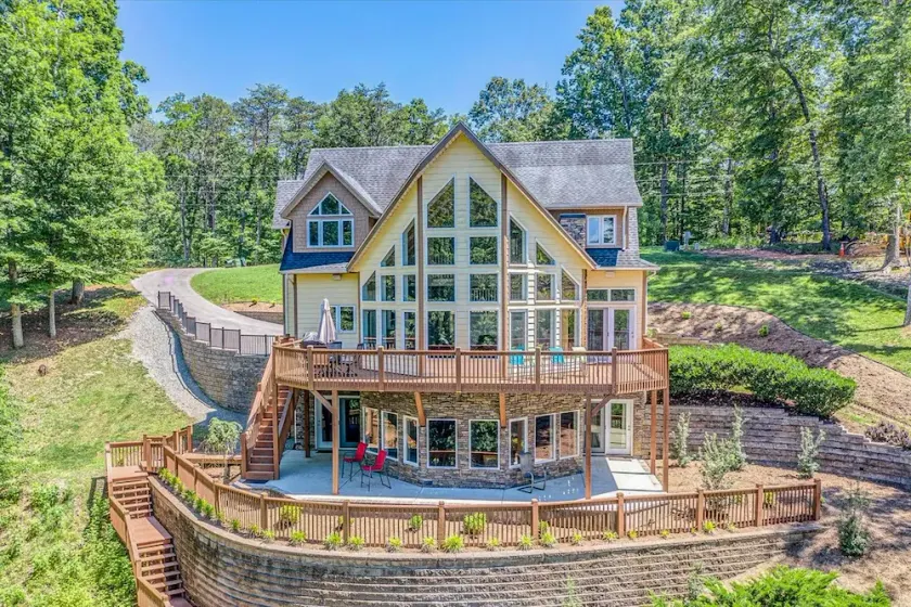 Osprey Cove - Custom Lakefront home with 2-story dock, Wifi, Game Room and Fireplace - Image 1