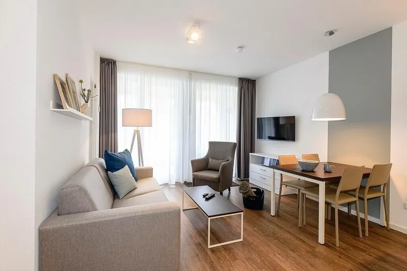 Familienapartment mit Terrasse und Freier Nutzung von Saunabereich & Schwimmbad - Image 1