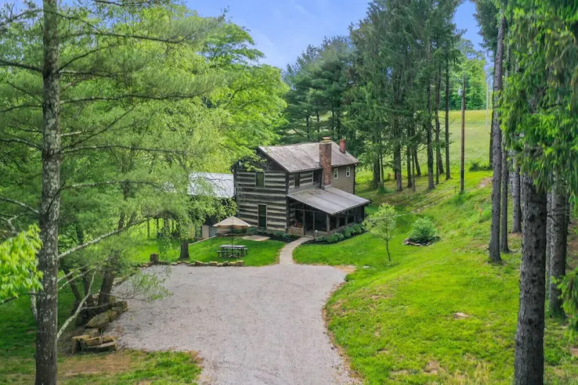 ONE OF A KIND HISTORIC LOG CABIN ON 10+ ACRES IN HOCKING HILLS - Image 1