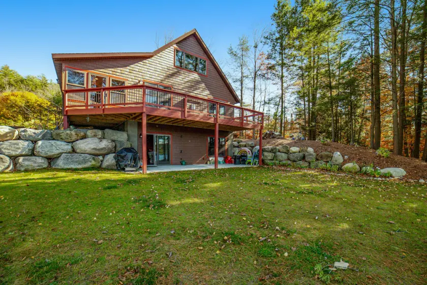 Gorgeous Lakefront Home with a Fire Pit, Two Living Areas, and a Sunroom - Image 1