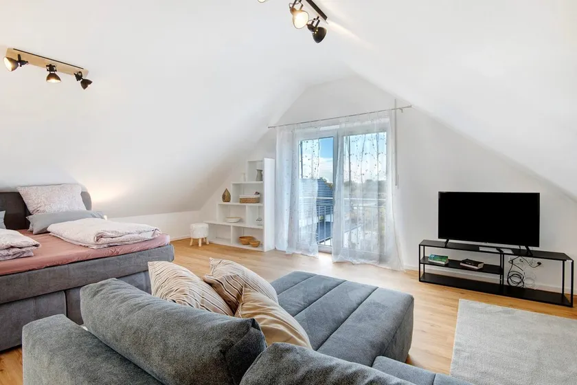 Attic Studio on the Danube Cycle Path with Mountain View, Balcony, and Wi-Fi - Image 1