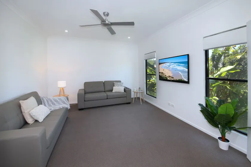 Our beachside home offers the perfect mix of coastal charm and modern living! - Image 1