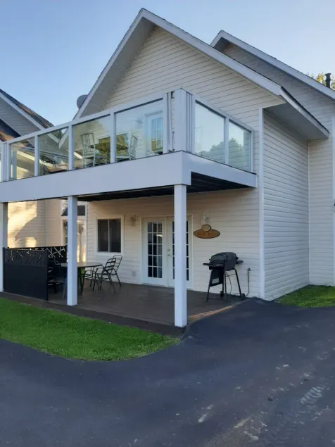 This 4-season chalet is the perfect get-away for family and friends. - Image 1