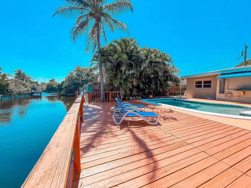 Private Pool Home Canal Views Waterfront Deck - Image 1