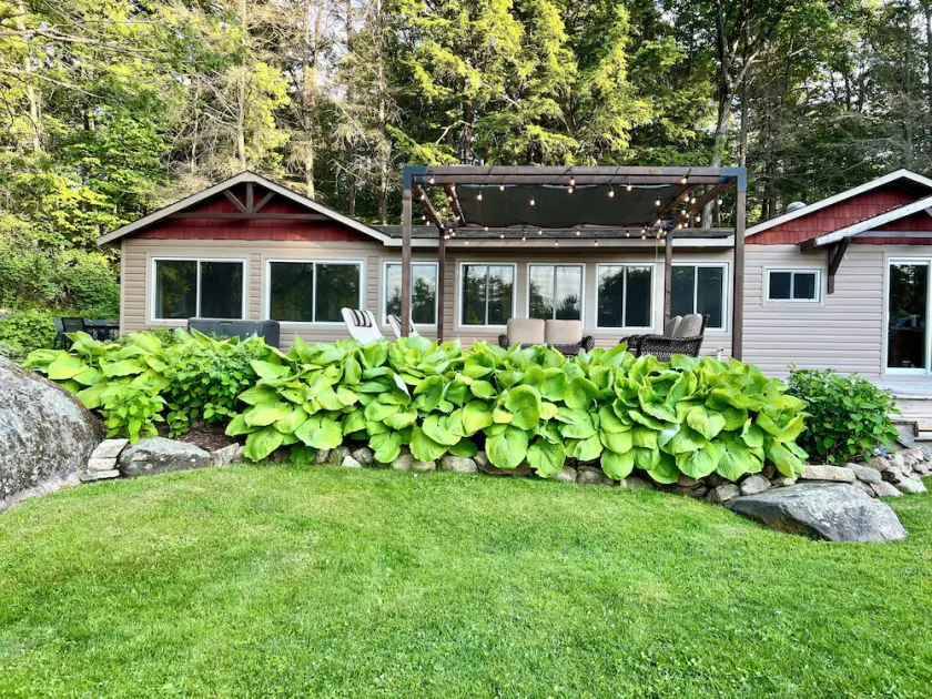 Bright and spacious lakeside cottage with firepit, hot tub and AC on Stoney Lake - Image 1