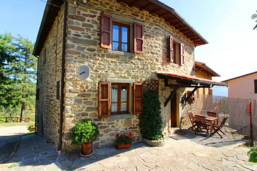 Part of an old stone country house enjoying a splendid panoramic view over the woods of the Casentin - Image 1
