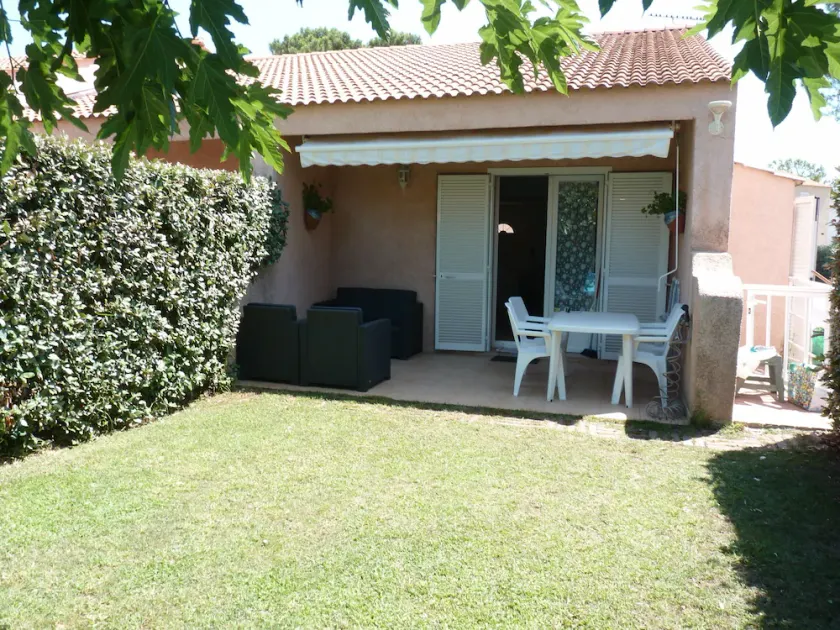 Mini villa by the sea, gated residence with trees. - Image 1