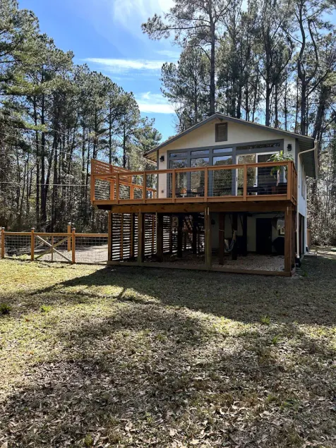 Cozy coastal oasis w/ wooded views and wrap around deck. Close to Dauphin Island - Image 1