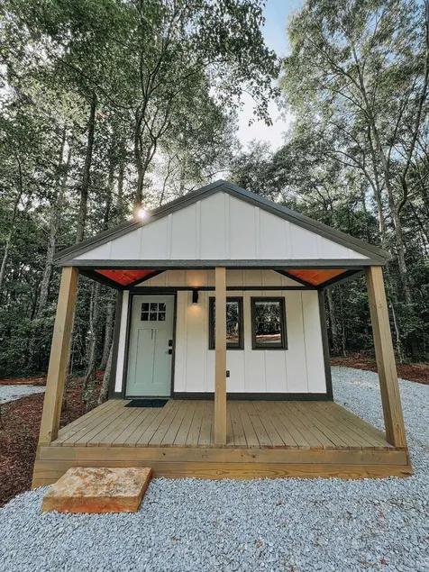Cabin #1: Studio style layout with kitchenette and a large gravel parking pad beside the cabin for easy boat or trailer storage. - Image 1