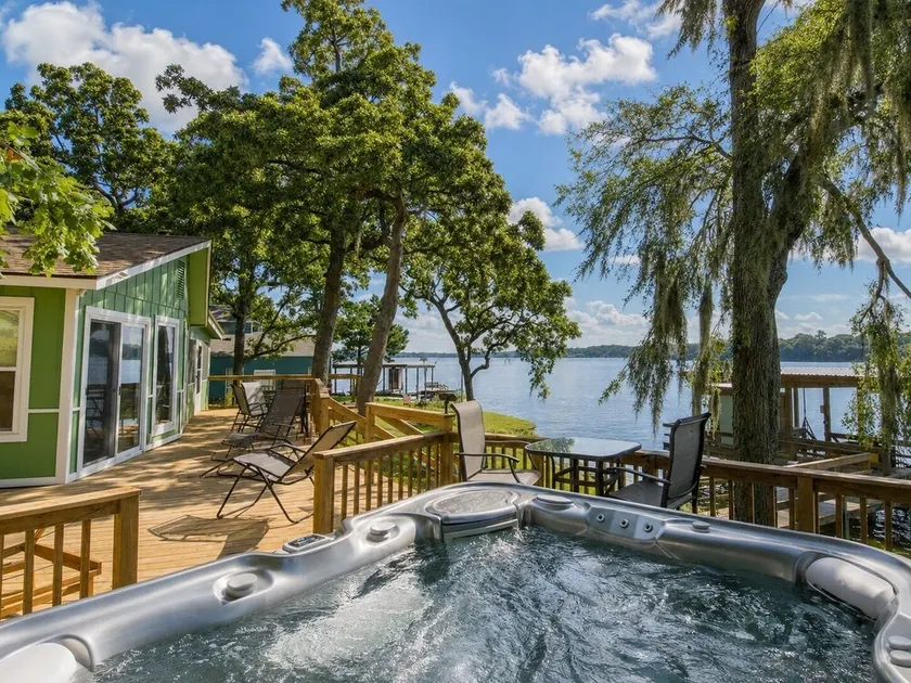 Romantic Lakefront Retreat: Hot Tub, Private Deck, Screened Porch, Dock & Kayaks - Image 1