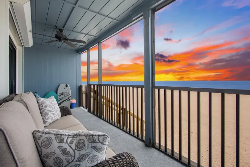 Beachfront Condo, Private Patio with Steps to the Sand and Pool - Gulf Place 7B - Image 1