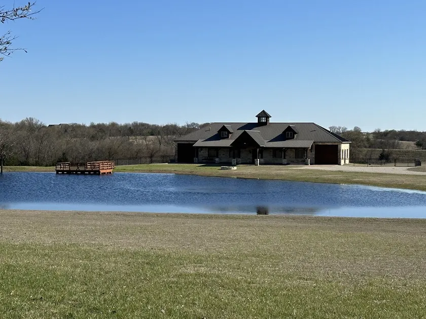 Home on 30 acres with pond - Image 1
