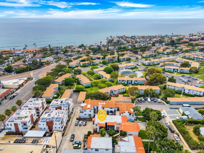 North PB Jewel: Sun-Soaked Second Story, Steps to Beach & Tourmaline Surfing - Image 1