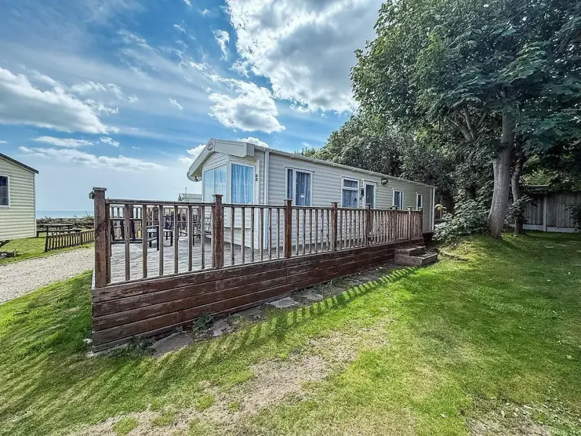 Beautiful Caravan With Decking And Wifi At Azure Sea, Suffolk Ref 32025Az - Image 1