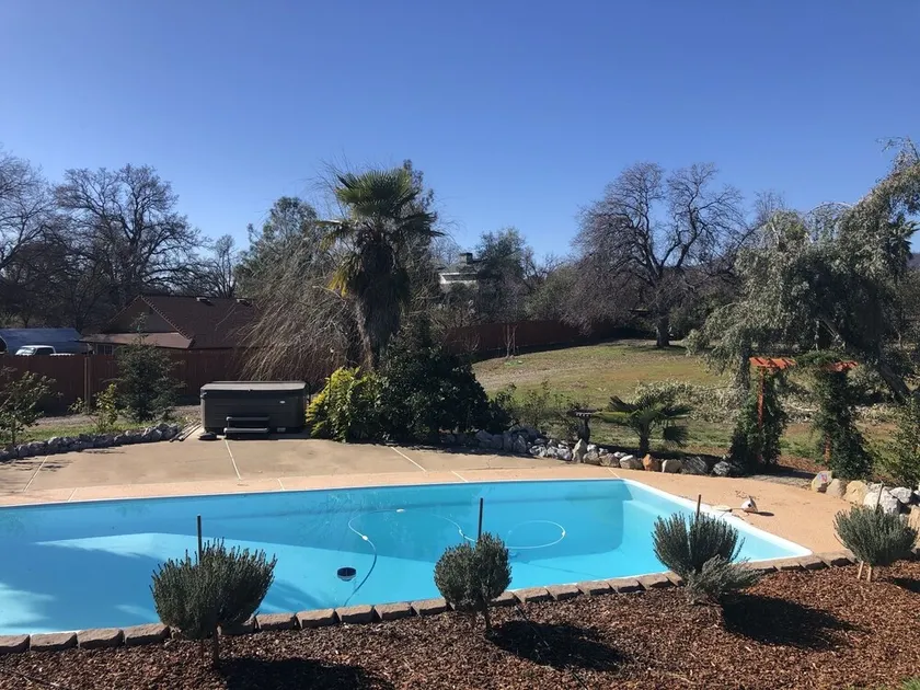 Country oasis with shared swimming pool & hot tub, back yard/deck  - Image 1