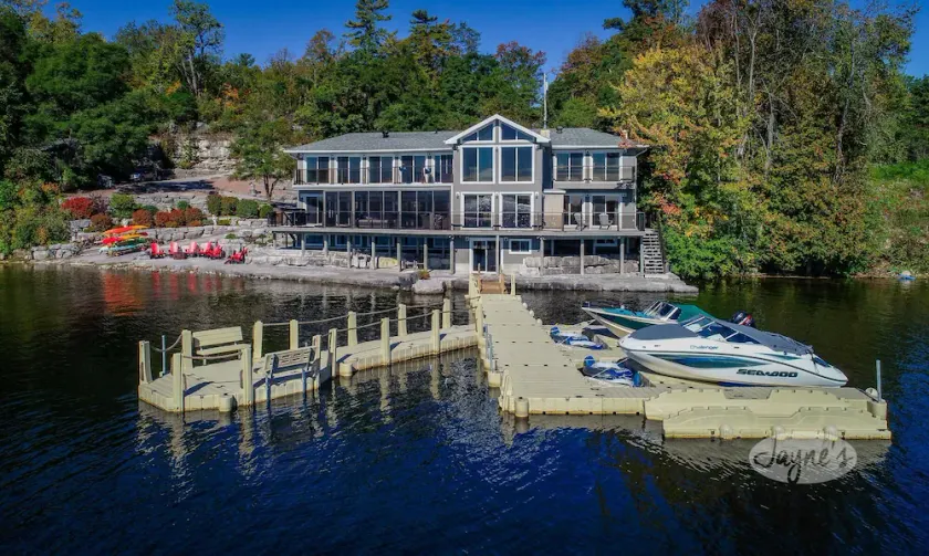 Expansive luxury cottage on Pigeon Lake! 2 Bunkies, Watertoys and Firepits! - Image 1