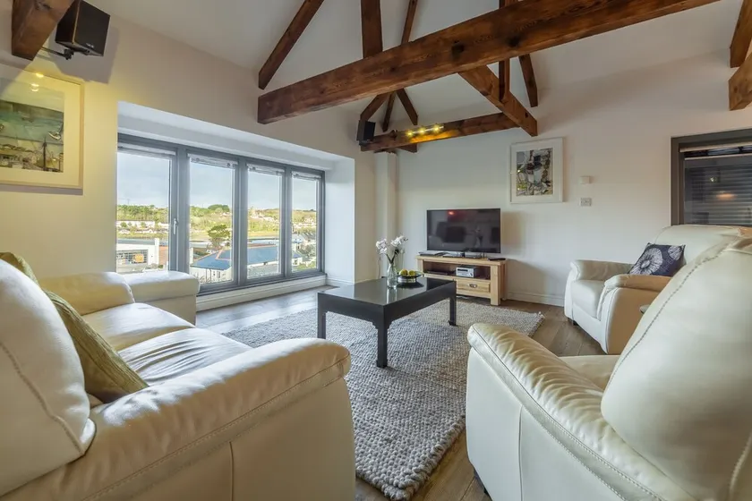 A luxurious two-bedroom apartment in a converted, listed building. - Image 1